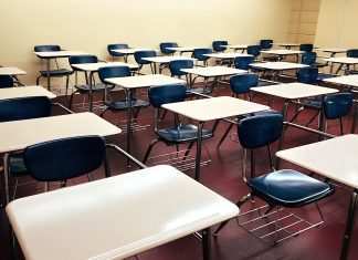 A scuola con Covid-19: che succede se si mostrano i sintomi?