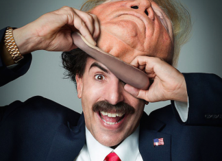 Borat 2: la critica a Trump e agli anti-abortisti Borat con la maschera di Trump - Photo Credits: Indiewire.com