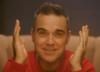 Robbie Williams, online il video di “Can’t Stop Christmas” Robbie Williams: è online il video di Can't Stop Christmas - Photo Credits: Un frame del video