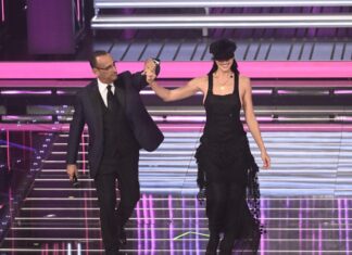 Le pagelle look della terza serata di Sanremo 2026: Michele Bravi eleganza sporca, Irina Shayk regina della runaway