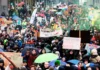 Crisi climatica, riduzione drastica dei Fondi verdi: Francia accusata di negare il problema Francia Crisi Climatica - Photo Credits Contropiano (Modificato con Canva)